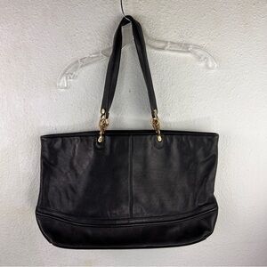 SUSAN GAIL SHOULDER SHOPPER. Black pebbled leather w/snap close. Shoulder straps